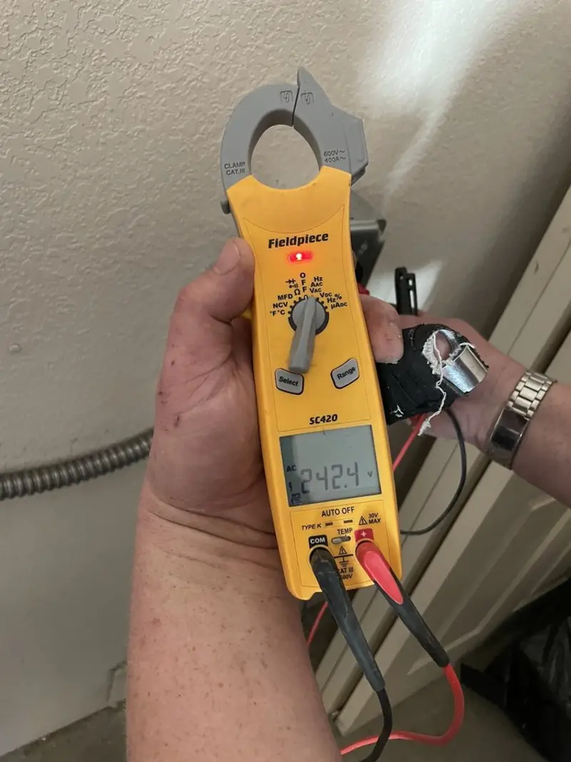 Voltage testing with clamp meter during Electrical Installation Services in Lakeside